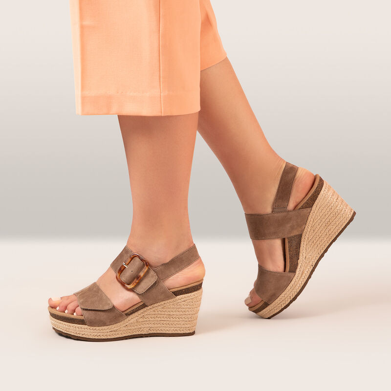 taupe genuine leather wedge with buckle on foot